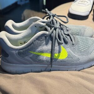 Nike Kids Gray Sneakers with Neon Yellow Swoosh